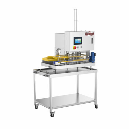 A compact and efficient canning machine by Redwood Stainless Systems, designed for precision in beverage packaging. Featuring a stainless steel frame, a digital control panel, and an automated filling system, this machine ensures smooth and consistent can sealing for breweries and beverage producers.
