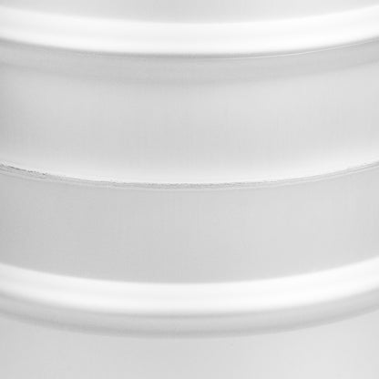 Close-up image of the center seam on a stainless steel beer keg.