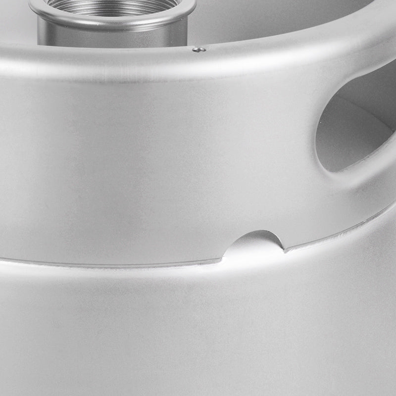 Close-up image of the drain hole, handle, and threaded neck on a stainless steel beer keg.